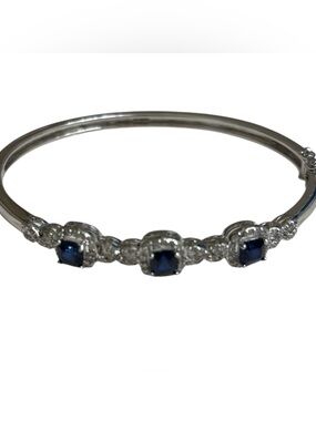 Silver plated bangle with sapphire blue CZ stones